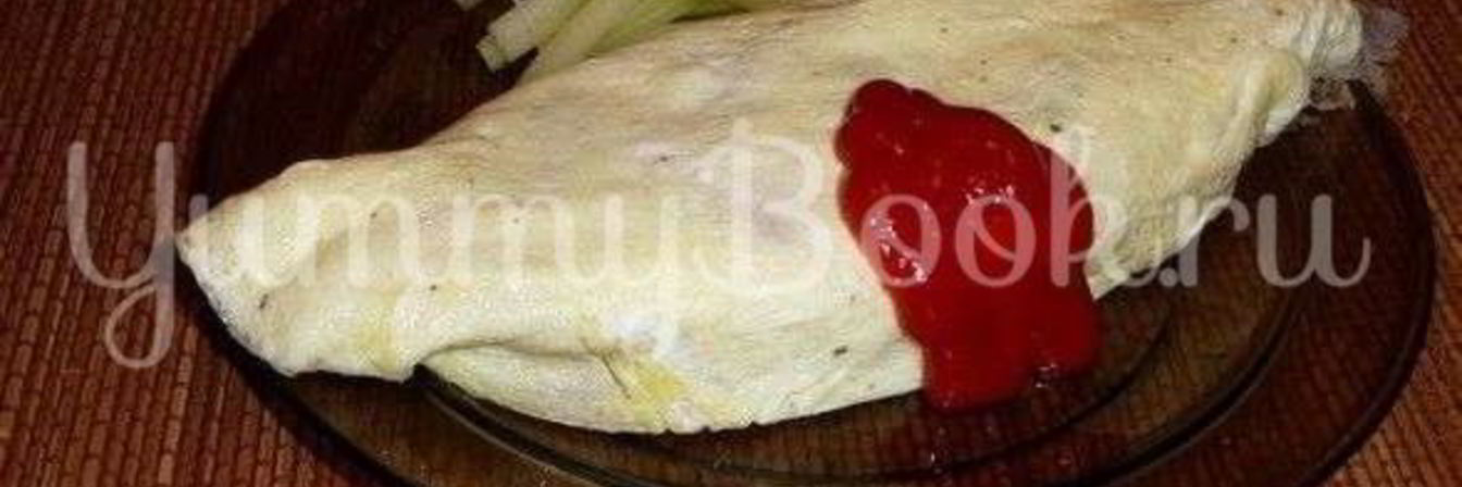 Омурайс — рис с курицей и томатами в яичной обертке