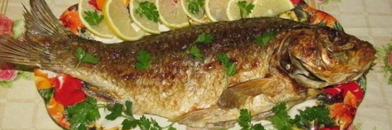 Сазан, запеченный в духовке