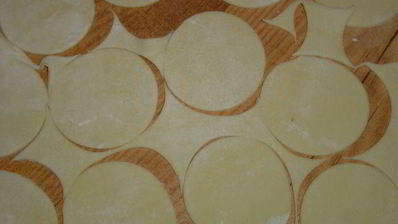 жареные пельмени с грибами и капустой