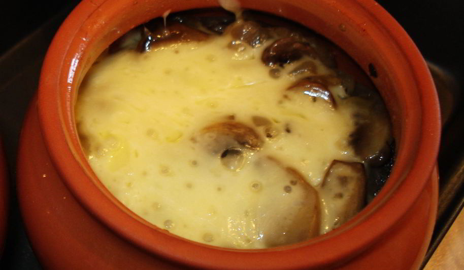 Рецепт фаршированных кальмаров в горшочке