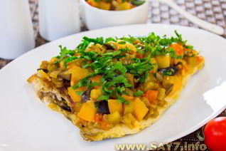 Камбала под овощами