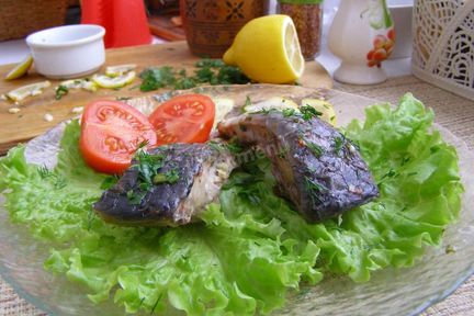 Речная рыба в мультиварке с лимонами на пару