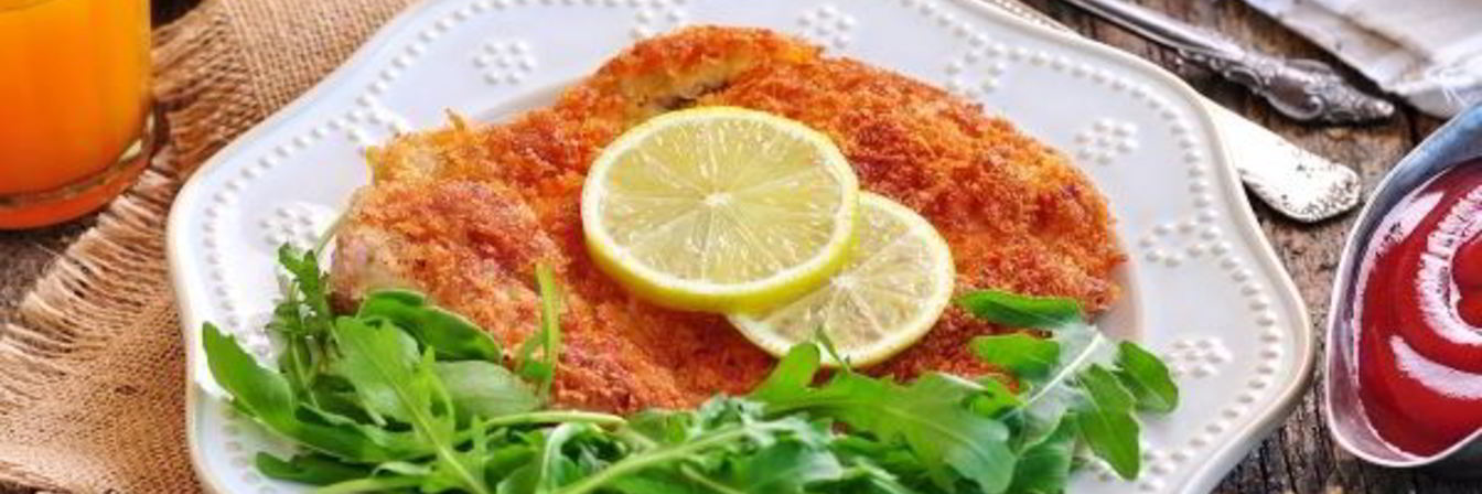 Шницель из свиной корейки на кости