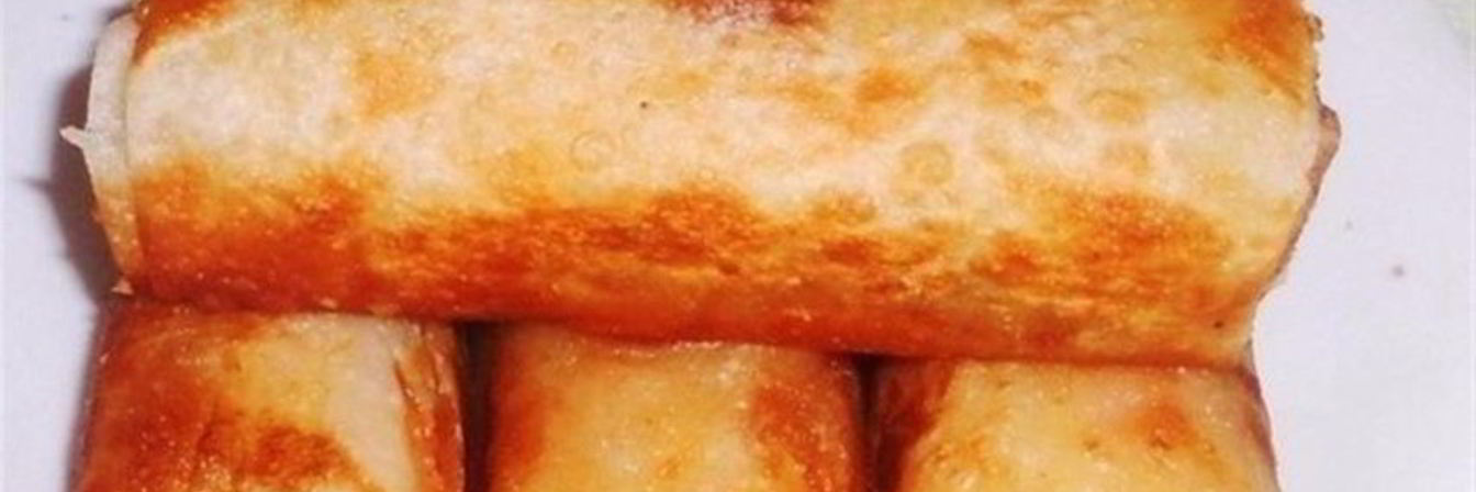 Сосиски в картофельно-сырной шубе из лаваша