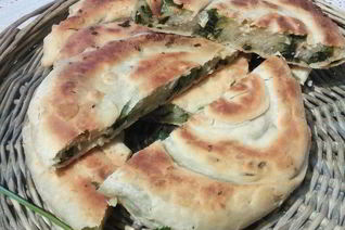 Слоеные лепешки на топленом масле с сезонной зеленью