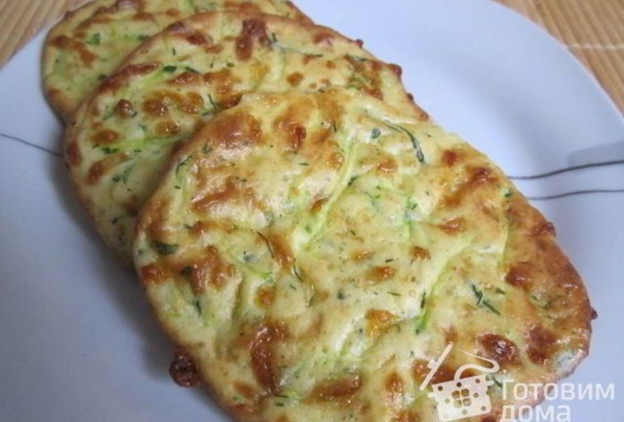 Кабачково-сырные оладьи, запеченные в духовке