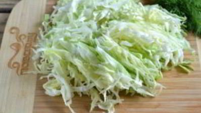 маринованная капуста с помидорами