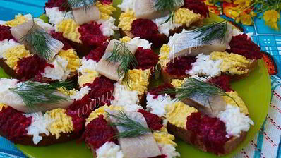 праздничные бутерброды с сельдью